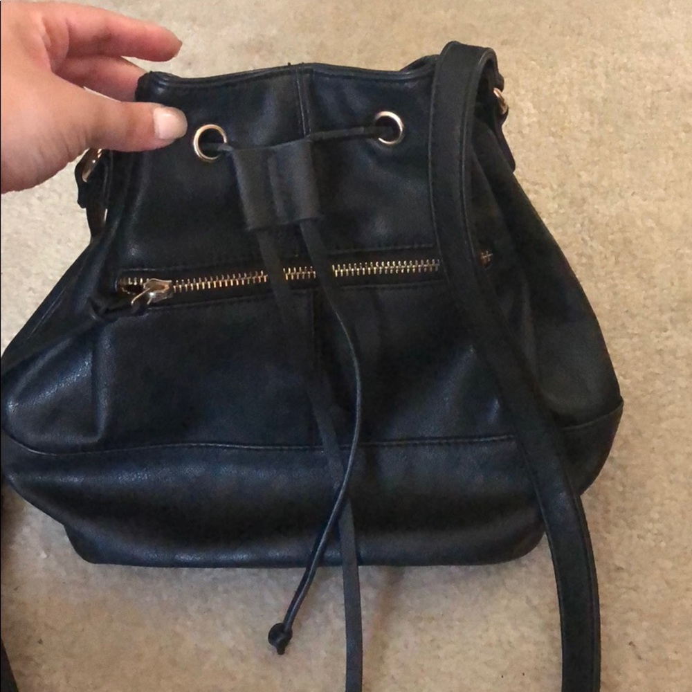 Draw string cross body
